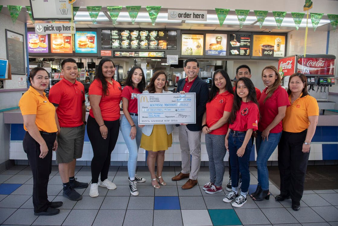 McDonald’s of Saipan is offering a $5,000 hole-in-one prize that will be featured at the upcoming annual NMC Foundation Golf Tournament on Saturday, March 20, 2021. In this pre-pandemic photo are McDonald’s executive assistant to the president, Mable Ayuyu-Glenn, center, Northern Marianas College Interim President Frankie Eliptico, Rutzel Perez, acting general manager of McDonald’s Garapan, Jocelyn Asistores, general manager of McDonald’s Middle Road, and NMC students.